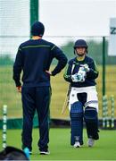 11 June 2020; Laura Delany, right, and head coach of Ireland Women’s team Ed Joyce during a training session at the Cricket Ireland High Performance Training Centre on the Sport Ireland Campus in Dublin. In accordance with Cricket Ireland’s Coronavirus (COVID-19) Safe Return to Training Protocols, more than 30 of Ireland’s elite cricketers returned to training this week at three dedicated hubs across the country, at Dublin, Belfast and Bready. Both senior men’s and women’s squads undertook modified training sessions in line with Government guidelines following the outbreak of the Coronavirus (COVID-19) pandemic. Photo by Seb Daly/Sportsfile