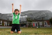14 June 2020; Republic of Ireland supporter and Havelock Square resident Paddy Allen, age 7, celebrates scoring on his friend Johnny Murphy, age 8, during a kickabout on Havelock Square in the shadow of the Aviva Stadium in Dublin. Monday 15 June 2020 was the scheduled date for the opening game in Dublin of UEFA EURO 2020, the Group E opener between Poland and Play-off B Winner. UEFA EURO 2020, to be held in 12 European cities across 12 UEFA countries, was originally scheduled to take place from 12 June to 12 July 2020. On 17 March 2020, UEFA announced that the tournament would be delayed by a year due to the COVID-19 pandemic in Europe, and proposed it take place from 11 June to 11 July 2021. Photo by Stephen McCarthy/Sportsfile