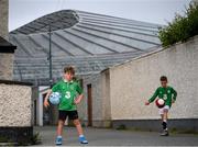 14 June 2020; Havelock Square residents Paddy Allen, age 7, left, and Johnny Murphy, age 8, pose for a portrait near the Aviva Stadium in Dublin. Monday 15 June 2020 was the scheduled date for the opening game in Dublin of UEFA EURO 2020, the Group E opener between Poland and Play-off B Winner. UEFA EURO 2020, to be held in 12 European cities across 12 UEFA countries, was originally scheduled to take place from 12 June to 12 July 2020. On 17 March 2020, UEFA announced that the tournament would be delayed by a year due to the COVID-19 pandemic in Europe, and proposed it take place from 11 June to 11 July 2021. Photo by Stephen McCarthy/Sportsfile
