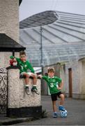 14 June 2020; Havelock Square residents Johnny Murphy, age 8, left, and Paddy Allen, age 7, pose for a portrait near the Aviva Stadium in Dublin. Monday 15 June 2020 was the scheduled date for the opening game in Dublin of UEFA EURO 2020, the Group E opener between Poland and Play-off B Winner. UEFA EURO 2020, to be held in 12 European cities across 12 UEFA countries, was originally scheduled to take place from 12 June to 12 July 2020. On 17 March 2020, UEFA announced that the tournament would be delayed by a year due to the COVID-19 pandemic in Europe, and proposed it take place from 11 June to 11 July 2021. Photo by Stephen McCarthy/Sportsfile