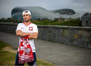 14 June 2020; Poland supporter Bart Boruc, from Naas, Kildare, poses for a portrait near the Aviva Stadium in Dublin. Monday 15 June 2020 was the scheduled date for the opening game in Dublin of UEFA EURO 2020, the Group E opener between Poland and Play-off B Winner. UEFA EURO 2020, to be held in 12 European cities across 12 UEFA countries, was originally scheduled to take place from 12 June to 12 July 2020. On 17 March 2020, UEFA announced that the tournament would be delayed by a year due to the COVID-19 pandemic in Europe, and proposed it take place from 11 June to 11 July 2021. Photo by Stephen McCarthy/Sportsfile