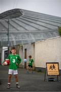 14 June 2020; Havelock Square residents Johnny Murphy, age 8, left, and Paddy Allen, age 7, pose for a portrait near the Aviva Stadium in Dublin. Monday 15 June 2020 was the scheduled date for the opening game in Dublin of UEFA EURO 2020, the Group E opener between Poland and Play-off B Winner. UEFA EURO 2020, to be held in 12 European cities across 12 UEFA countries, was originally scheduled to take place from 12 June to 12 July 2020. On 17 March 2020, UEFA announced that the tournament would be delayed by a year due to the COVID-19 pandemic in Europe, and proposed it take place from 11 June to 11 July 2021. Photo by Stephen McCarthy/Sportsfile