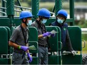 15 June 2020; Stall handlers wearing face masks and gloves prior to the Roscommon Maiden at Roscommon Racecourse in Roscommon. Horse racing has been allowed to resume from June 8 under the Irish Government’s Roadmap for Reopening of Society and Business following strict protocols of social distancing and hand sanitisation among others allowing it to return in a phased manner, having been suspended from March 25 due to the Irish Government's efforts to contain the spread of the Coronavirus (COVID-19) pandemic. Photo by Seb Daly/Sportsfile