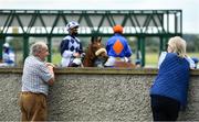 15 June 2020; Spectators Peter Hennigan, from Rockfield, Roscommon, and Ann Mahon, from Drinaun, Roscommon, watch as horses are loaded into the stalls prior to the www.roscommonracecourse.ie Handicap at Roscommon Racecourse in Roscommon. Horse racing has been allowed to resume from June 8 under the Irish Government’s Roadmap for Reopening of Society and Business following strict protocols of social distancing and hand sanitisation among others allowing it to return in a phased manner, having been suspended from March 25 due to the Irish Government's efforts to contain the spread of the Coronavirus (COVID-19) pandemic. Photo by Seb Daly/Sportsfile