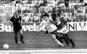17 June 1990; Andy Townsend of Republic of Ireland in action against Ahmed El-Kass of Egypt during the FIFA World Cup 1990 Group F match between Republic of Ireland and Egypt at Stadio La Favorita in Palermo, Italy. Photo by Ray McManus/Sportsfile