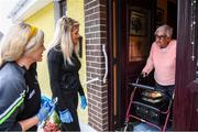 17 June 2020; Grainne O'Neill and daughter Darcy, members of St. Canice’s GAA club in Dungiven, Derry, delivering hot dinners to Maureen McGilligan, a member of the local community, as GAA clubs nationwide help out their local communities during restrictions imposed by the Irish and British Governments in an effort to contain the spread of the Coronavirus (COVID-19) pandemic. GAA facilities reopened on Monday June 8 for the first time since March 25 with club matches provisionally due to start on July 31 and intercounty matches due to to take place no sooner that October 17. Photo by Stephen McCarthy/Sportsfile