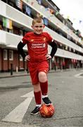 17 June 2020; NOW TV surprised Liverpool superfan Sean McCabe (11) and the residents of Canon Mooney Gardens in Ringsend with a special message from Liverpool legend Jamie Carragher. To show its appreciation for their enduring community spirit, NOW TV also gifted all residents with NOW TV Sky Sports Passes so that they can watch the returning football games. Premier League action returns with a double-header today and all the action is available to stream on NOW TV. Pictured is Sean McCabe in Canon Mooney Gardens in Dublin. Photo by Sam Barnes/Sportsfile