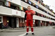 17 June 2020; NOW TV surprised Liverpool superfan Sean McCabe (11) and the residents of Canon Mooney Gardens in Ringsend with a special message from Liverpool legend Jamie Carragher. To show its appreciation for their enduring community spirit, NOW TV also gifted all residents with NOW TV Sky Sports Passes so that they can watch the returning football games. Premier League action returns with a double-header today and all the action is available to stream on NOW TV. Pictured is Sean McCabe in Canon Mooney Gardens in Dublin. Photo by Sam Barnes/Sportsfile