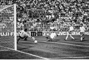 21 June 1990; Ruud Gullit of Netherlands scores his side's first goal past Republic of Ireland goalkeeper Packie Bonner watched by Republic of Ireland defenders Paul McGrath, Steve Staunton and Kevin Moran during the FIFA World Cup 1990 Group F match between Republic of Ireland and Netherlands at Stadio La Favorita in Palermo, Italy. Photo by Ray McManus/Sportsfile