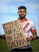 21 June 2020; An Ghaeltacht footballer Franz Sauerland holds a sign in Irish which reads 'Cine amháin An Cine Daonna', and translates in English to 'One race, the human race'. To The New Generation is a series of portraits of Black athletes in Ireland, representing their communities and families, and in some instances Ireland, in a variety of sports, including athletics, basketball, GAA, rugby and soccer. Their stories reflect a contemporary and multicultural Ireland and Ireland’s place in the world, moving more and more from an emigrant nation to an immigrant nation offering hope and a life to many people from beyond our shores. Photo by Ramsey Cardy/Sportsfile