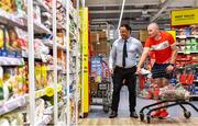 22 June 2020; Monaleen GAA player Daniel Power is assisted by Nathan Nahar, assistant manager, while shopping in SuperValu castletroy on behalf of The Sisters of the Little Company of Mary in Milford, Limerick. GAA clubs nationwide help out their local communities during restrictions imposed by the Irish Government in an effort to contain the spread of the Coronavirus (COVID-19) pandemic. GAA facilities reopened on Monday June 8 for the first time since March 25 with club matches provisionally due to start on July 31 and intercounty matches due to to take place no sooner that October 17. Photo by Eóin Noonan/Sportsfile