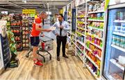 22 June 2020; Monaleen GAA player Daniel Power is assisted by Nathan Nahar, assistant manager, while shopping in SuperValu castletroy on behalf of The Sisters of the Little Company of Mary in Milford, Limerick. GAA clubs nationwide help out their local communities during restrictions imposed by the Irish Government in an effort to contain the spread of the Coronavirus (COVID-19) pandemic. GAA facilities reopened on Monday June 8 for the first time since March 25 with club matches provisionally due to start on July 31 and intercounty matches due to to take place no sooner that October 17. Photo by Eóin Noonan/Sportsfile