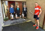 22 June 2020; Monaleen GAA player Daniel Power delivers shopping to The Sisters of the Little Company of Mary from left, Sister Alice Culhane, Sister Breda Conway and Sister Denise Maher in Milford, Limerick. GAA clubs nationwide help out their local communities during restrictions imposed by the Irish Government in an effort to contain the spread of the Coronavirus (COVID-19) pandemic. GAA facilities reopened on Monday June 8 for the first time since March 25 with club matches provisionally due to start on July 31 and intercounty matches due to to take place no sooner that October 17. Photo by Eóin Noonan/Sportsfile