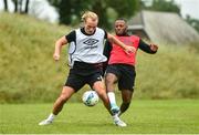 23 June 2020; Greg Sloggett, left, in action against Lido Lotefa during a Dundalk training session at Oriel Park in Dundalk, Louth. Following approval from the Football Association of Ireland and the Irish Government, the four European qualified SSE Airtricity League teams resumed collective training. On March 12, the FAI announced the cessation of all football under their jurisdiction upon directives from the Irish Government, the Department of Health and UEFA, due to the outbreak of the Coronavirus (COVID-19) pandemic. Photo by Ben McShane/Sportsfile