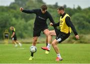 23 June 2020; Will Patching, left, is tackled by Andy Boyle during a Dundalk training session at Oriel Park in Dundalk, Louth. Following approval from the Football Association of Ireland and the Irish Government, the four European qualified SSE Airtricity League teams resumed collective training. On March 12, the FAI announced the cessation of all football under their jurisdiction upon directives from the Irish Government, the Department of Health and UEFA, due to the outbreak of the Coronavirus (COVID-19) pandemic. Photo by Ben McShane/Sportsfile