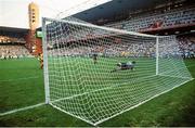 25 June 1990; Packie Bonner of Republic of Ireland saves a penalty from Daniel Timofte of Romania during the penalty shoot out during the FIFA World Cup 1990 Round of 16 match between Republic of Ireland and Romania at the Stadio Luigi Ferraris in Genoa, Italy. Photo by Ray McManus/Sportsfile