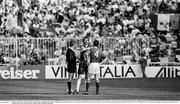 25 June 1990; Team captains Silviu Lung of Romania and Mick McCarthy of Republic of Ireland with referee Jose Roberto Wright during the coin toss prior to the start of the penalty shoot out during the FIFA World Cup 1990 Round of 16 match between Republic of Ireland and Romania at the Stadio Luigi Ferraris in Genoa, Italy. Photo by Ray McManus/Sportsfile