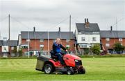 24 June 2020; Groundsman Criostoir Mac Cionnaith cuts the grass ahead of training sessions this evening at Setanta GAA Club in Ballymun, Dublin. Following approval from the GAA and the Irish Government, the GAA released its safe return to play protocols, allowing pitches to be opened for non contact training on 24 June and for training and challenge games to resume from 29 June. On March 25, the GAA announced the cessation of all GAA activities and closures of all GAA facilities under their jurisdiction upon directives from the Irish Government in an effort to contain the Coronavirus (COVID-19) pandemic. Photo by Seb Daly/Sportsfile