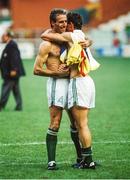 25 June 1990; Mick McCarthy, left, and Kevin Moran of Republic of Ireland celebrates after the FIFA World Cup 1990 Round of 16 match between Republic of Ireland and Romania at the Stadio Luigi Ferraris in Genoa, Italy. Photo by Ray McManus/Sportsfile