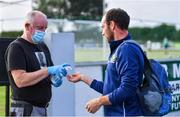 24 June 2020; Cully Hayden, Covid Supervisor, gives hand sanitiser to Kevin Murnaghan before a Moorefield Senior Football Squad training session at Moorefield GAA club in Newbridge, Kildare. Following approval from the GAA and the Irish Government, the GAA released its safe return to play protocols, allowing pitches to be opened for non contact training on 24 June and for training and challenge games to resume from 29 June. On March 25, the GAA announced the cessation of all GAA activities and closures of all GAA facilities under their jurisdiction upon directives from the Irish Government in an effort to contain the Coronavirus (COVID-19) pandemic. Photo by Piaras Ó Mídheach/Sportsfile