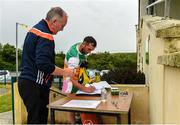 25 June 2020; Paul Gallagher, team officials, sanitizes the officals and players before a Glenswilly GAA Club training session at Glenkerragh in Donegal. Following approval from the GAA and the Irish Government, the GAA released its safe return to play protocols, allowing pitches to be opened for non contact training on 24 June and for training and challenge games to resume from 29 June. On March 25, the GAA announced the cessation of all GAA activities and closures of all GAA facilities under their jurisdiction upon directives from the Irish Government in an effort to contain the Coronavirus (COVID-19) pandemic. Photo by Oliver McVeigh/Sportsfile