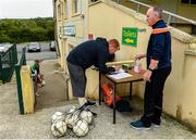 25 June 2020; Paul Gallagher, team officials, sanitizes the officals and players before a Glenswilly GAA Club training session at Glenkerragh in Donegal. Following approval from the GAA and the Irish Government, the GAA released its safe return to play protocols, allowing pitches to be opened for non contact training on 24 June and for training and challenge games to resume from 29 June. On March 25, the GAA announced the cessation of all GAA activities and closures of all GAA facilities under their jurisdiction upon directives from the Irish Government in an effort to contain the Coronavirus (COVID-19) pandemic. Photo by Oliver McVeigh/Sportsfile