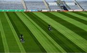 26 June 2020; Croke Park's groundsman Colm Daly, left, cuts the pitch at Croke Park in Dublin. The GAA announced that inter-county fixtures will resume on October 17. Following approval from the GAA and the Irish Government, the GAA released its safe return to play protocols, allowing pitches to be opened for training and challenge games from 29 June. On March 25, the GAA announced the cessation of all GAA activities and closures of all GAA facilities under their jurisdiction upon directives from the Irish Government in an effort to contain the Coronavirus (COVID-19) pandemic. Photo by Ramsey Cardy/Sportsfile