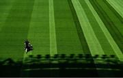 26 June 2020; Croke Park's groundsman Colm Daly cuts the pitch at Croke Park in Dublin. The GAA announced that inter-county fixtures will resume on October 17. Following approval from the GAA and the Irish Government, the GAA released its safe return to play protocols, allowing pitches to be opened for training and challenge games from 29 June. On March 25, the GAA announced the cessation of all GAA activities and closures of all GAA facilities under their jurisdiction upon directives from the Irish Government in an effort to contain the Coronavirus (COVID-19) pandemic. Photo by Ramsey Cardy/Sportsfile