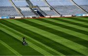 26 June 2020; Croke Park's groundsman Colm Daly cuts the pitch at Croke Park in Dublin. The GAA announced that inter-county fixtures will resume on October 17. Following approval from the GAA and the Irish Government, the GAA released its safe return to play protocols, allowing pitches to be opened for training and challenge games from 29 June. On March 25, the GAA announced the cessation of all GAA activities and closures of all GAA facilities under their jurisdiction upon directives from the Irish Government in an effort to contain the Coronavirus (COVID-19) pandemic. Photo by Ramsey Cardy/Sportsfile