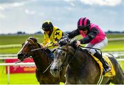 27 June 2020; Big Gossey, right, with Michael Hussey up, races alongside eventual third place Taggalo, left, with Conor Hoban up, on their way to winning the Dubai Duty Free Tennis Championships Handicap during day two of the Dubai Duty Free Irish Derby Festival at The Curragh Racecourse in Kildare. Horse Racing continues behind closed doors following strict protocols having been suspended from March 25 due to the Irish Government's efforts to contain the spread of the Coronavirus (COVID-19) pandemic. Photo by Seb Daly/Sportsfile