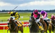 27 June 2020; Big Gossey, right, with Michael Hussey up, races alongside eventual third place Taggalo, left, with Conor Hoban up, on their way to winning the Dubai Duty Free Tennis Championships Handicap during day two of the Dubai Duty Free Irish Derby Festival at The Curragh Racecourse in Kildare. Horse Racing continues behind closed doors following strict protocols having been suspended from March 25 due to the Irish Government's efforts to contain the spread of the Coronavirus (COVID-19) pandemic. Photo by Seb Daly/Sportsfile