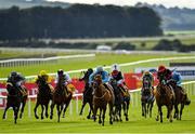 27 June 2020; Big Baby Bull, centre, with Joey Sheridan up, on their way to winning the Dubai Duty Free Millennium Millionaire Handicap during day two of the Dubai Duty Free Irish Derby Festival at The Curragh Racecourse in Kildare. Horse Racing continues behind closed doors following strict protocols having been suspended from March 25 due to the Irish Government's efforts to contain the spread of the Coronavirus (COVID-19) pandemic. Photo by Seb Daly/Sportsfile