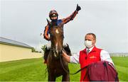 27 June 2020; Jockey Seamie Heffernan celebrates after winning the Dubai Duty Free Irish Derby on Santiago during day two of the Dubai Duty Free Irish Derby Festival at The Curragh Racecourse in Kildare. Horse Racing continues behind closed doors following strict protocols having been suspended from March 25 due to the Irish Government's efforts to contain the spread of the Coronavirus (COVID-19) pandemic. Photo by Seb Daly/Sportsfile