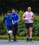 28 June 2020; Rory O'Connor of Rory Stories with members of Skryne GAA Club during the Solo For Livie Challenge in Ballymagarvey, Meath. The fundraising event is in support of 9 month old Livie Mulhern, from Balrath in Meath. Livie has been diagnosed with a rare and serious genetic neuromuscular condition called spinal muscular atrophy (SMA) type 1. SMA is caused by a gene deletion which results in deterioration of Livie’s nerve cells connecting her brain and spinal cord to her body’s muscles. The money raised from the event will be put towards a once-off gene therapy called Zolgensma, which is currently only available in the USA. It is the worlds most expensive treatment at a cost of $2,100,000. Photo by Ramsey Cardy/Sportsfile