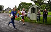 28 June 2020; Rory O'Connor of Rory Stories with former Meath footballer Trevor Giles, left, during the Solo For Livie Challenge in Ballymagarvey, Meath. The fundraising event is in support of 9 month old Livie Mulhern, from Balrath in Meath. Livie has been diagnosed with a rare and serious genetic neuromuscular condition called spinal muscular atrophy (SMA) type 1. SMA is caused by a gene deletion which results in deterioration of Livie’s nerve cells connecting her brain and spinal cord to her body’s muscles. The money raised from the event will be put towards a once-off gene therapy called Zolgensma, which is currently only available in the USA. It is the worlds most expensive treatment at a cost of $2,100,000. Photo by Ramsey Cardy/Sportsfile