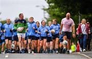 28 June 2020; Rory O'Connor of Rory Stories and Meath football manager Andy McEntee, left, with members of Garristown GAA Club during the Solo For Livie Challenge in Garristown, Meath. The fundraising event is in support of 9 month old Livie Mulhern, from Balrath in Meath. Livie has been diagnosed with a rare and serious genetic neuromuscular condition called spinal muscular atrophy (SMA) type 1. SMA is caused by a gene deletion which results in deterioration of Livie’s nerve cells connecting her brain and spinal cord to her body’s muscles. The money raised from the event will be put towards a once-off gene therapy called Zolgensma, which is currently only available in the USA. It is the worlds most expensive treatment at a cost of $2,100,000. Photo by Ramsey Cardy/Sportsfile