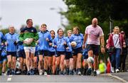 28 June 2020; Rory O'Connor of Rory Stories and Meath football manager Andy McEntee, left, with members of Garristown GAA Club during the Solo For Livie Challenge in Garristown, Meath. The fundraising event is in support of 9 month old Livie Mulhern, from Balrath in Meath. Livie has been diagnosed with a rare and serious genetic neuromuscular condition called spinal muscular atrophy (SMA) type 1. SMA is caused by a gene deletion which results in deterioration of Livie’s nerve cells connecting her brain and spinal cord to her body’s muscles. The money raised from the event will be put towards a once-off gene therapy called Zolgensma, which is currently only available in the USA. It is the worlds most expensive treatment at a cost of $2,100,000. Photo by Ramsey Cardy/Sportsfile