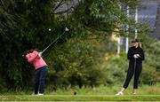 29 June 2020; Leona Maguire tees off from the 3rd tee box watches by Olivia Mehaffey during the Flogas Irish Scratch Series at the Seapoint Golf Club in Termonfeckin, Louth. Photo by Matt Browne/Sportsfile