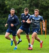 29 June 2020; Rob Kearney, left, Ross Byrne, centre, and Jordan Larmour during Leinster rugby squad training at UCD in Dublin. Rugby teams have been approved for return of restricted training under IRFU and the Irish Government’s Roadmap for Reopening of Society and Business following strict protocols allowing it to return in a phased manner, having been suspended since March due to the Irish Government's efforts to contain the spread of the Coronavirus (COVID-19) pandemic. Photo by Marcus Ó Buachalla for Leinster Rugby via Sportsfile