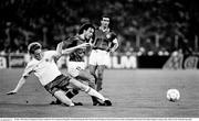 30 June 1990; Roberto Donadoni of Italy is tackled by Steve Staunton of Republic of Ireland during the FIFA World Cup 1990 Quarter-Final match between Italy and Republic of Ireland at the Stadio Olimpico in Rome, Italy. Photo by Ray McManus/Sportsfile