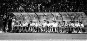 30 June 1990; Republic of Ireland manager Jack Charlton, left, and assistant Maurice Setters stand alongside the team substitutes bench, including during the FIFA World Cup 1990 Quarter-Final match between Italy and Republic of Ireland at the Stadio Olimpico in Rome, Italy. Photo by Ray McManus/Sportsfile