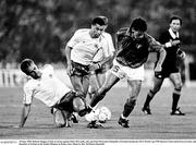 30 June 1990; Roberto Baggio of Italy in action against Mick McCarthy, left, and Paul McGrath of Republic of Ireland during the FIFA World Cup 1990 Quarter-Final match between Italy and Republic of Ireland at the Stadio Olimpico in Rome, Italy. Photo by Ray McManus/Sportsfile