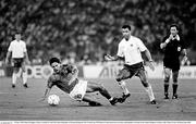 30 June 1990; Roberto Baggio of Italy is tackled by Paul McGrath of Republic of Ireland during the FIFA World Cup 1990 Quarter-Final match between Italy and Republic of Ireland at the Stadio Olimpico in Rome, Italy. Photo by Ray McManus/Sportsfile