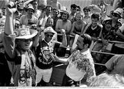 25 June 1990; A Republic of Ireland supporter is interviewed by Gabriel Egan of RTE television as he queues for match tickets prior to the FIFA World Cup 1990 Round of 16 match between Republic of Ireland and Romania at the Stadio Luigi Ferraris in Genoa, Italy. Photo by Ray McManus/Sportsfile