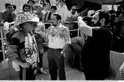 25 June 1990; A Republic of Ireland supporter is interviewed by Gabriel Egan of RTE television as he queues for match tickets prior to the FIFA World Cup 1990 Round of 16 match between Republic of Ireland and Romania at the Stadio Luigi Ferraris in Genoa, Italy. Photo by Ray McManus/Sportsfile