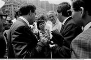 25 June 1990; Officials, including FAI official Donie Butler, right, speak as Republic of Ireland queue for match tickets prior to the FIFA World Cup 1990 Round of 16 match between Republic of Ireland and Romania at the Stadio Luigi Ferraris in Genoa, Italy. Photo by Ray McManus/Sportsfile