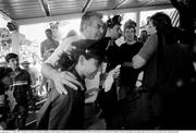 25 June 1990; FAI Honorary Treasurer Joe Delaney as Republic of Ireland supporters queue for match tickets prior to the FIFA World Cup 1990 Round of 16 match between Republic of Ireland and Romania at the Stadio Luigi Ferraris in Genoa, Italy. Photo by Ray McManus/Sportsfile