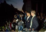 1 July 1990; Paul McGrath of Republic of Ireland is introduced by manager Jack Charlton during a homecoming reception on College Green in Dublin after their participation in the 1990 FIFA World Cup Finals in Italy. Photo by Ray McManus/Sportsfile