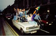 1 July 1990; Republic of Ireland supporters cheer on their team as they are brought by open top bus from Dublin Airport to College Green in Dublin city centre on their arrival home for a homecoming reception after their participation in the 1990 FIFA World Cup Finals in Italy. Photo by Ray McManus/Sportsfile