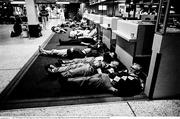 1 July 1990; Republic of Ireland supporters sleep in Rome airport as they await their flight hoome from the 1990 FIFA World Cup Finals in Italy. Photo by Ray McManus/Sportsfile